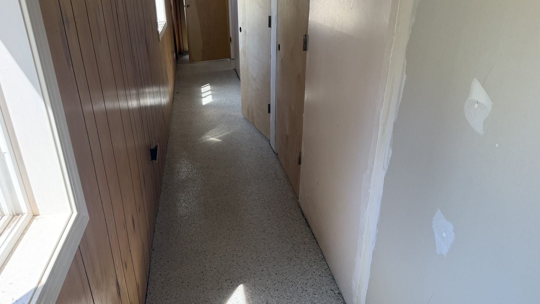 Our install - boarding facility hallway, one seamless surface
