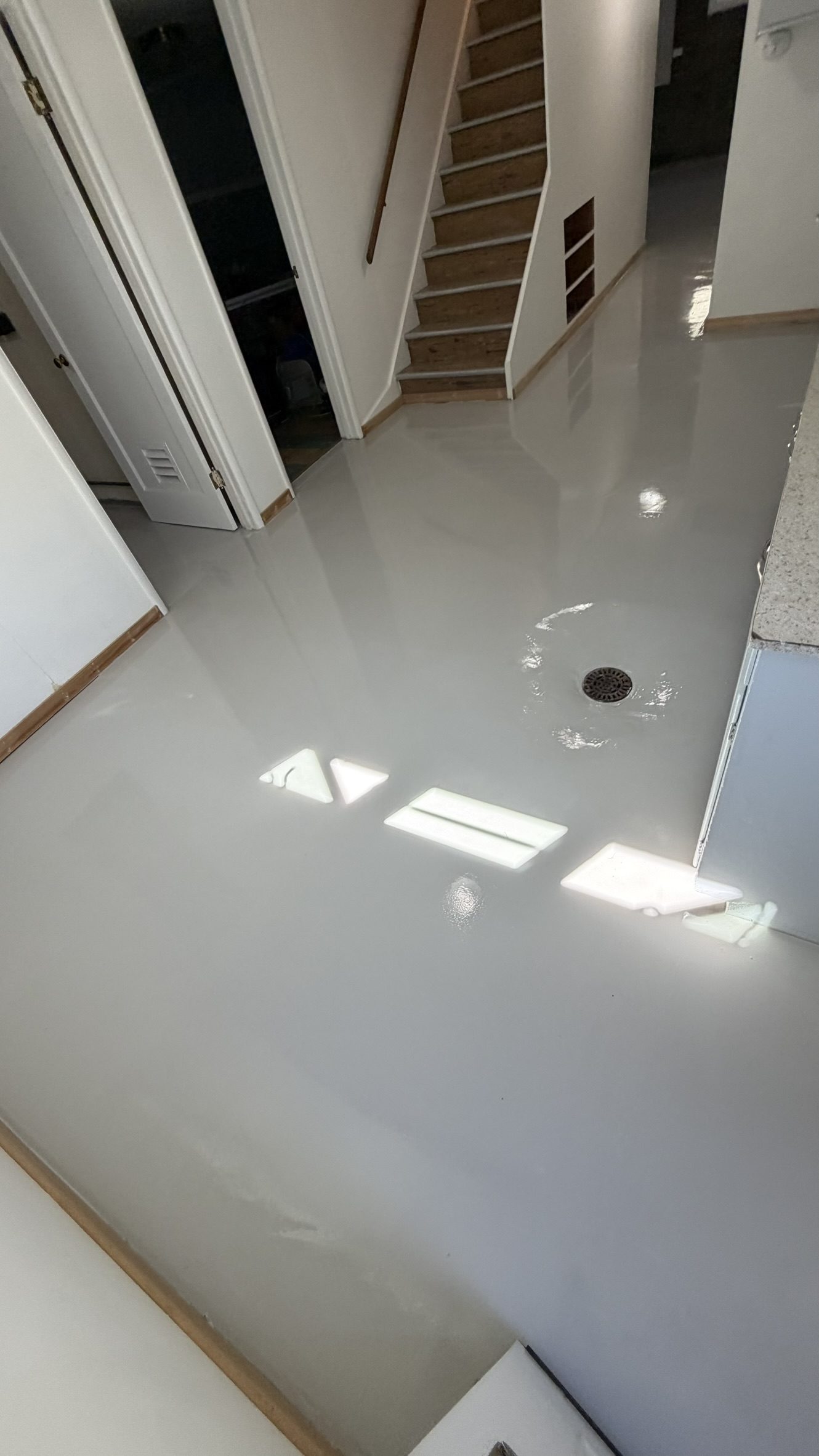 Moisture vapor barrier system, basement with drain